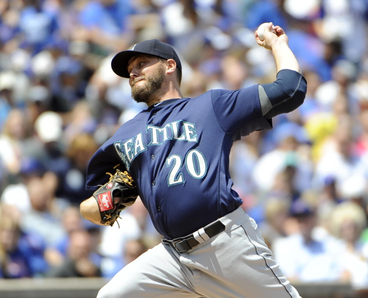 Seattle Mariners starting pitcher Wade Miley (20) throws against the Chicago Cubs during the first inning of an interleague baseball game, Saturday, July 30, 2016, in Chicago.