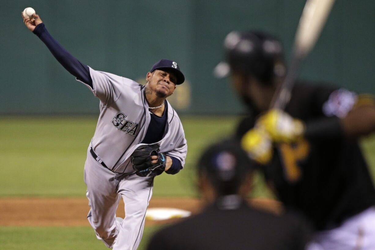 Seattle Mariners starting pitcher Felix Hernandez delivers during the fifth inning of a baseball game against the Pittsburgh Pirates in Pittsburgh, (Gene J.