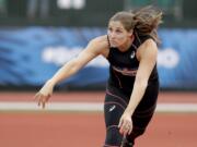 Kara Winger watches her throw during qualifying for the women's javelin at the U.S. Olympic Track and Field Trials, Thursday, July 7, 2016, in Eugene Ore.