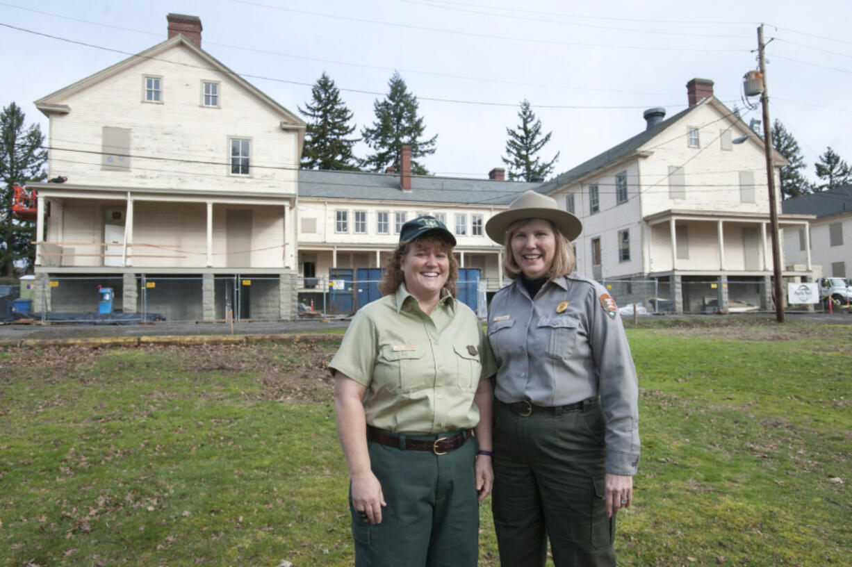 Gifford Pinchot National Forest Supervisor Gina Owens, left, stands with National Park Service Superintendent Tracy Fortmann in front of the Gifford Pinchot's future headquarters in East Barracks Building 987 on the Fort Vancouver National Site.