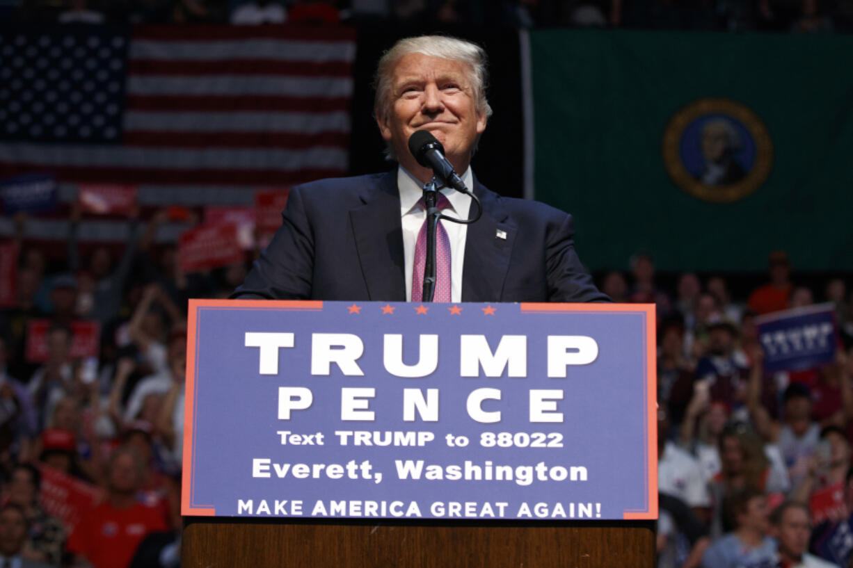 Republican presidential candidate Donald Trump speaks during a campaign rally Tuesday at Xfinity Arena in Everett.