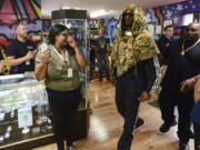 Rap star Snoop Dogg enters Mary Jane&#039;s House of Grass on Mill Plain Boulevard in Vancouver for a meet and greet event on Wednesday.