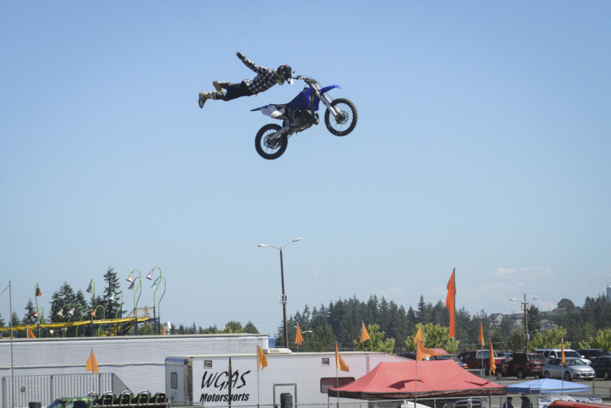 Vinnie Carbone performs a freestyle jump on his dirt bike Thursday at the Moto X Big Air Bikes show at the Clark County Fair grandstand. The entertainment continues at the fair's grandstand through the weekend, with a demolition derby today, a Tuff Trucks competition on Saturday and monster trucks on Sunday.