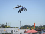 Vinnie Carbone performs a freestyle jump on his dirt bike Thursday at the Moto X Big Air Bikes show at the Clark County Fair grandstand. The entertainment continues at the fair's grandstand through the weekend, with a demolition derby today, a Tuff Trucks competition on Saturday and monster trucks on Sunday.