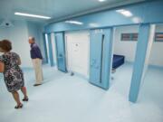 Clark County Jail Chief Ric Bishop and Commander Kimberly Beltran give a tour of an improved A-Pod, where prisoners who are at risk to themselves are housed.