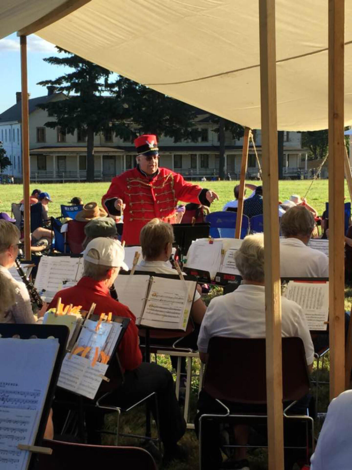 Felida: Vancouver Community Concert Band Director Jim Rourk leads the volunteer ensemble in a performance at the Vintage Base Ball game at the Fort Vancouver National Site.