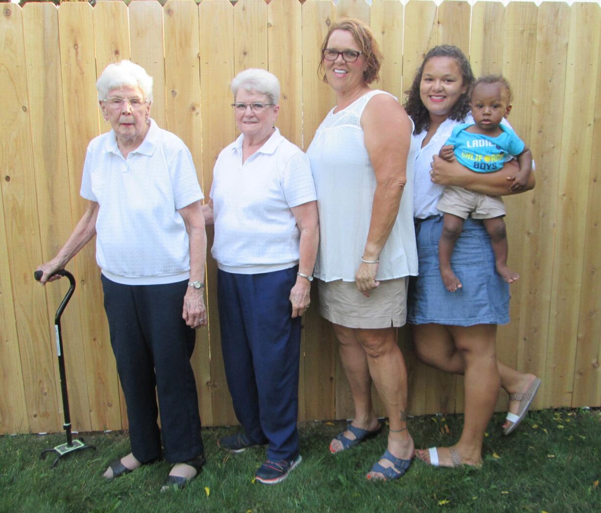 Forty-six family members of Mary Heidlebaugh, left, 90, of Vancouver, gathered for a family reunion on Aug. 13 in Leverich Park.