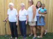 Forty-six family members of Mary Heidlebaugh, left, 90, of Vancouver, gathered for a family reunion on Aug. 13 in Leverich Park.