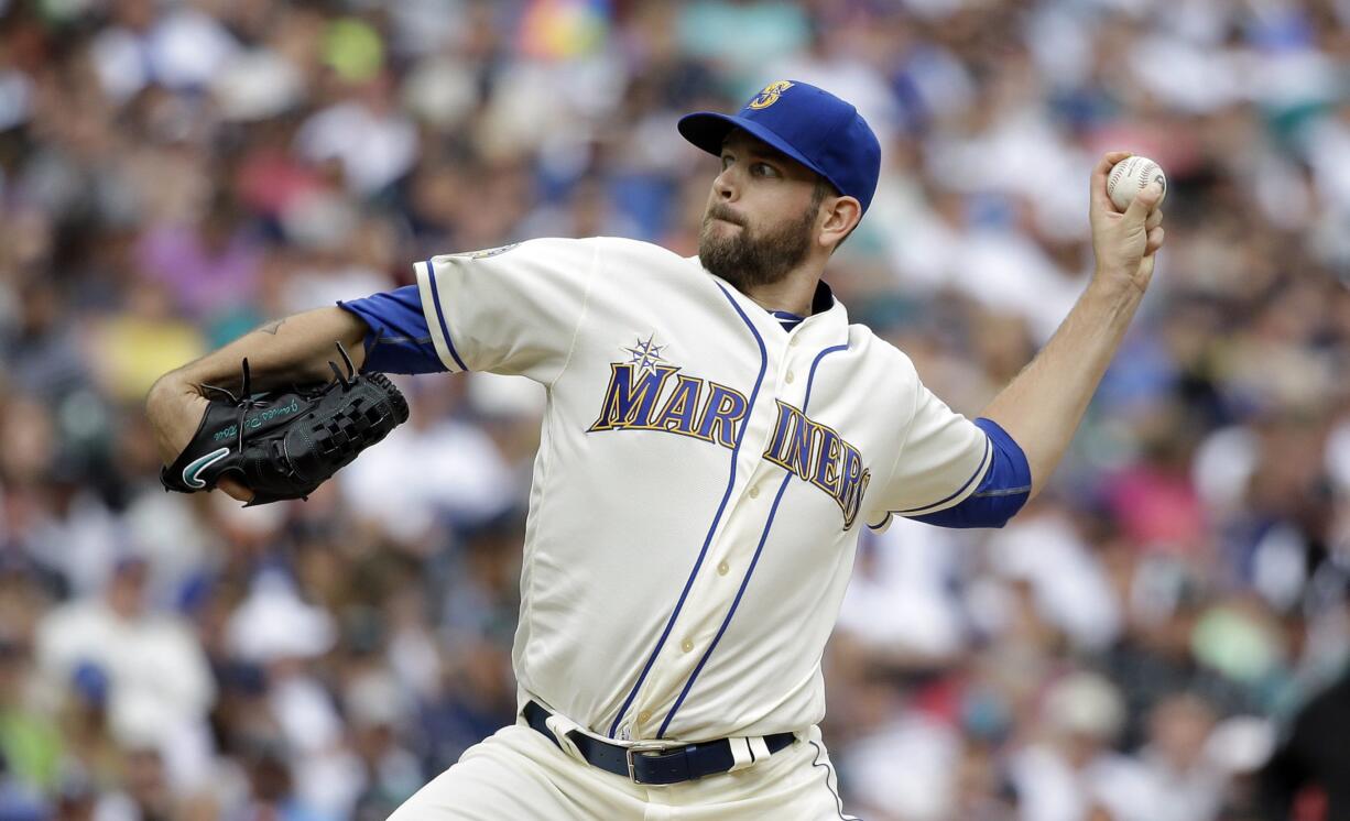 Seattle Mariners starting pitcher James Paxton throws against the Los Angeles Angels in the fifth inning of a baseball game Sunday, Aug. 7, 2016, in Seattle.