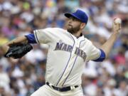 Seattle Mariners starting pitcher James Paxton throws against the Los Angeles Angels in the fifth inning of a baseball game Sunday, Aug. 7, 2016, in Seattle.