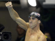 United States' Michael Phelps celebrates after winning the gold medal during the swimming competitions at the 2016 Summer Olympics, Tuesday, Aug. 9, 2016, in Rio de Janeiro, Brazil.