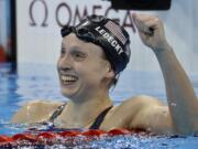 Unites States' Katie Ledecky celebrates after winning gold in the women's 800-meter freestyle final during the swimming competitions at the 2016 Summer Olympics, Friday, Aug. 12, 2016, in Rio de Janeiro, Brazil.