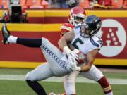 Seattle Seahawks defensive back Tanner McEvoy, front, makes a touchdown catch in the end zone in front of Kansas City Chiefs defensive back Malcolm Jackson during the second half of an NFL preseason football game in Kansas City, Mo., Saturday, Aug. 13, 2016.