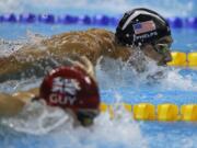 United States' Michael Phelps and Britain's James Guy compete in the men's 4 x 100-meter medley relay final during the swimming competitions at the 2016 Summer Olympics, Saturday, Aug. 13, 2016, in Rio de Janeiro, Brazil.