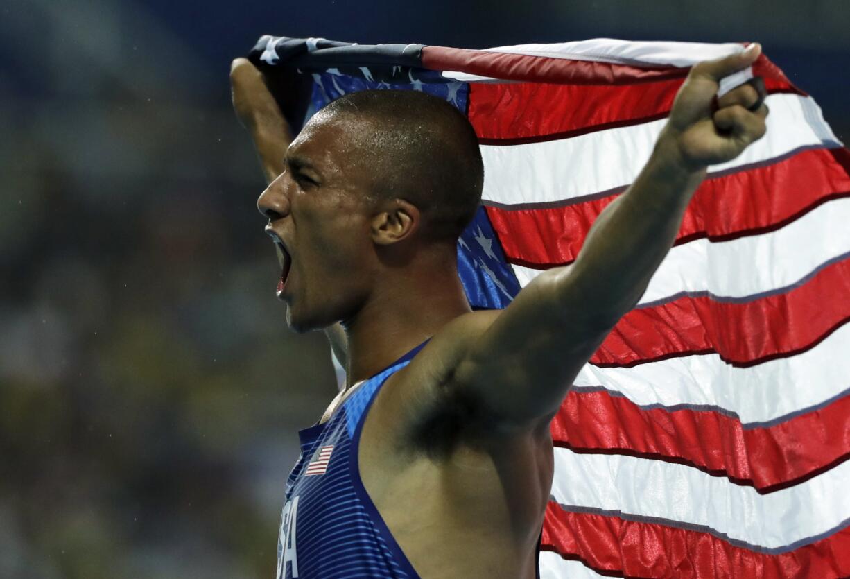 United States' Ashton Eaton celebrates winning the decathlon gold during the athletics competitions of the 2016 Summer Olympics at the Olympic stadium in Rio de Janeiro, Brazil, Thursday, Aug. 18, 2016. (AP Photo/Jae C.