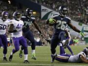 Seattle Seahawks running back Troymaine Pope (26) scores a touchdown against the Minnesota Vikings during the second half of a preseason NFL football game Thursday, Aug. 18, 2016, in Seattle.