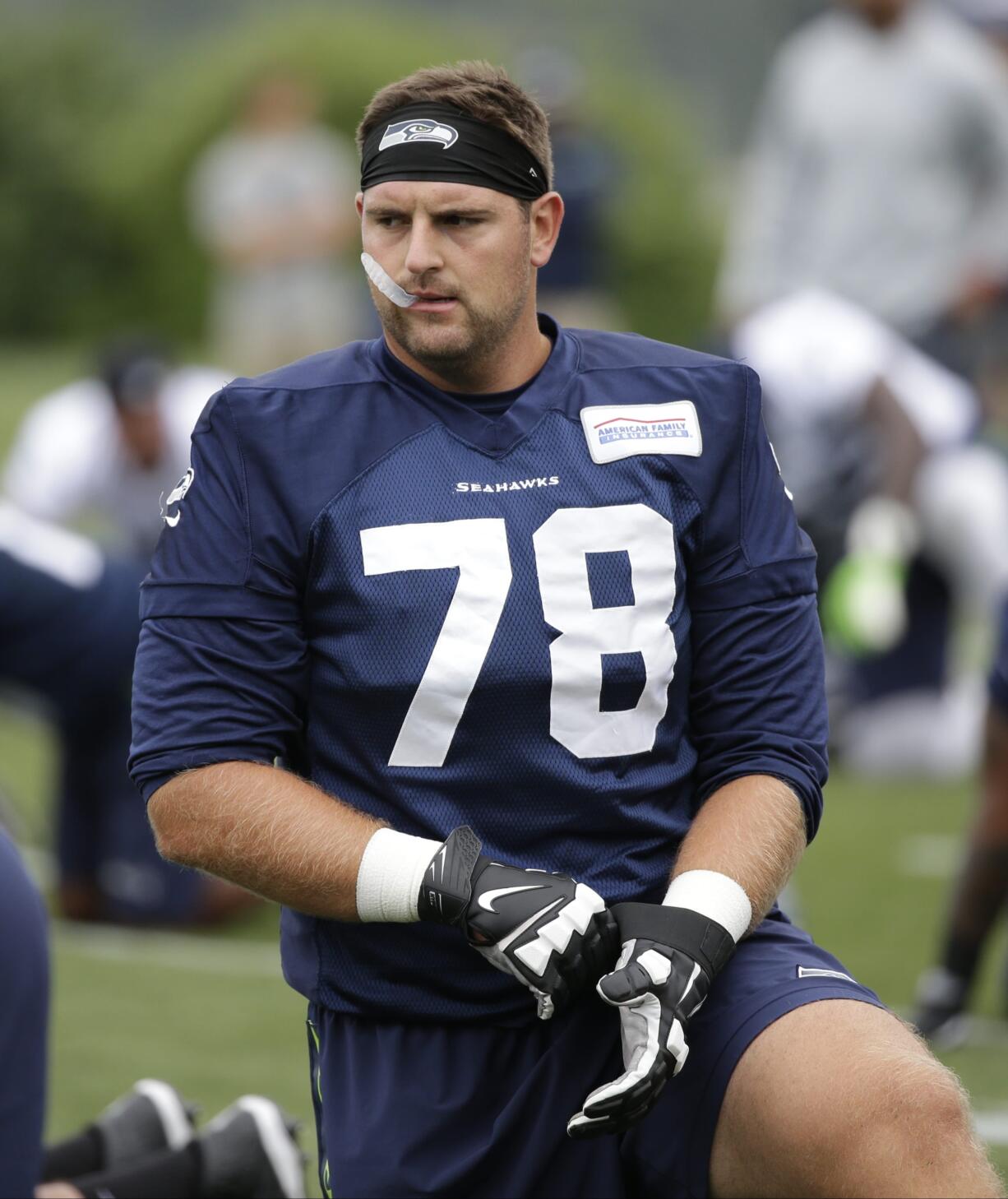 Seattle Seahawks' Bradley Sowell stretches during the team's NFL football training camp Saturday, July 30, 2016, in Renton, Wash.