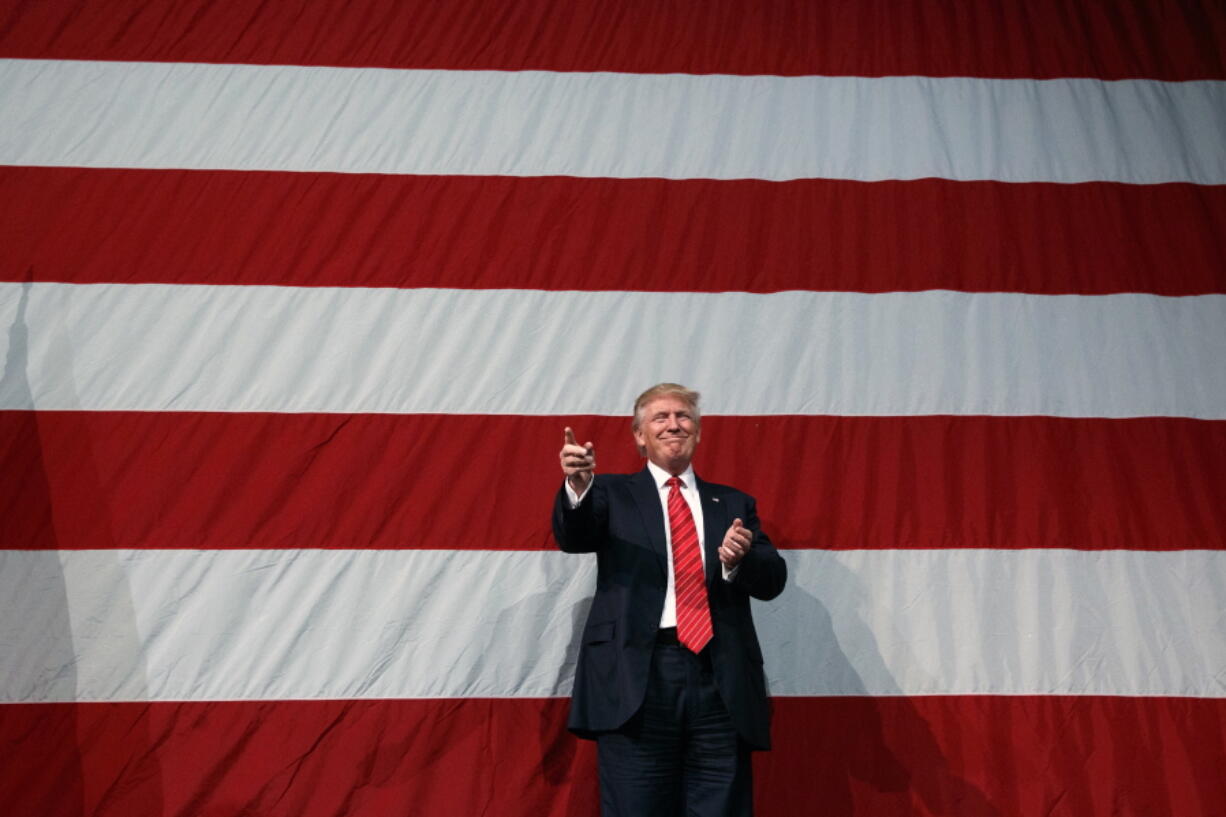 Republican presidential candidate Donald Trump arrives for a campaign rally at Crown Arena on Tuesday in Fayetteville, N.C.