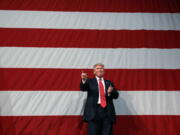 Republican presidential candidate Donald Trump arrives for a campaign rally at Crown Arena on Tuesday in Fayetteville, N.C.