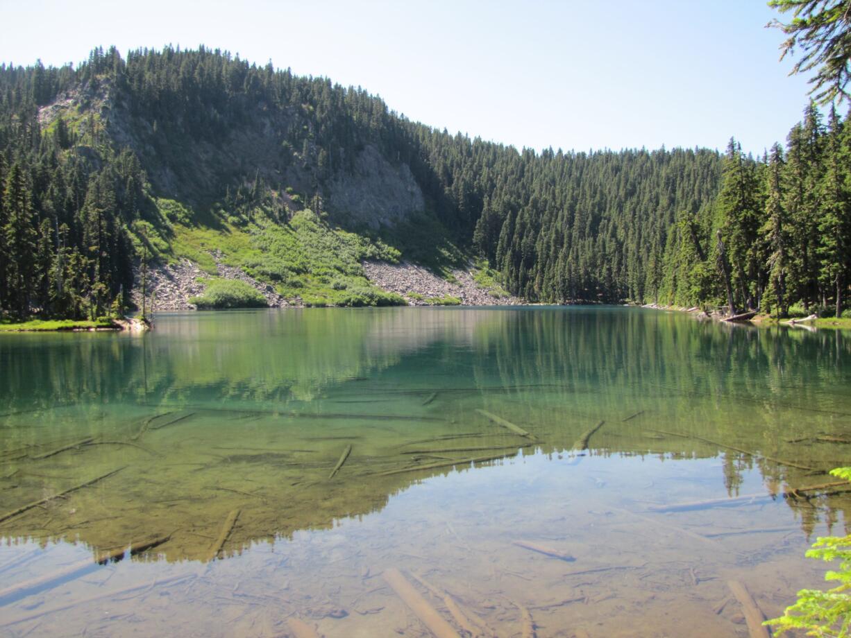 Blue Lake, at the junction of Thomas Lake trail No. 111 and the Pacific Crest National Scenic Trail No. 2000, is among the most popular destinations in Indian Heaven Wilderness.