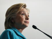 Democratic presidential candidate Hillary Clinton pauses as she speaks at a campaign event in Reno, Nev.