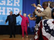 Democratic presidential candidate Hillary Clinton and Rep. Robert Brady, D-Pa., arrive at a Pennsylvania Democratic Party voter registration event at West Philadelphia High School in Philadelphia, Tuesday, Aug. 16, 2016.