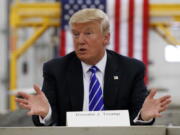 Republican presidential candidate Donald Trump speaks during a coal mining roundtable at Fitzgerald Peterbilt in Glade Spring, Va.