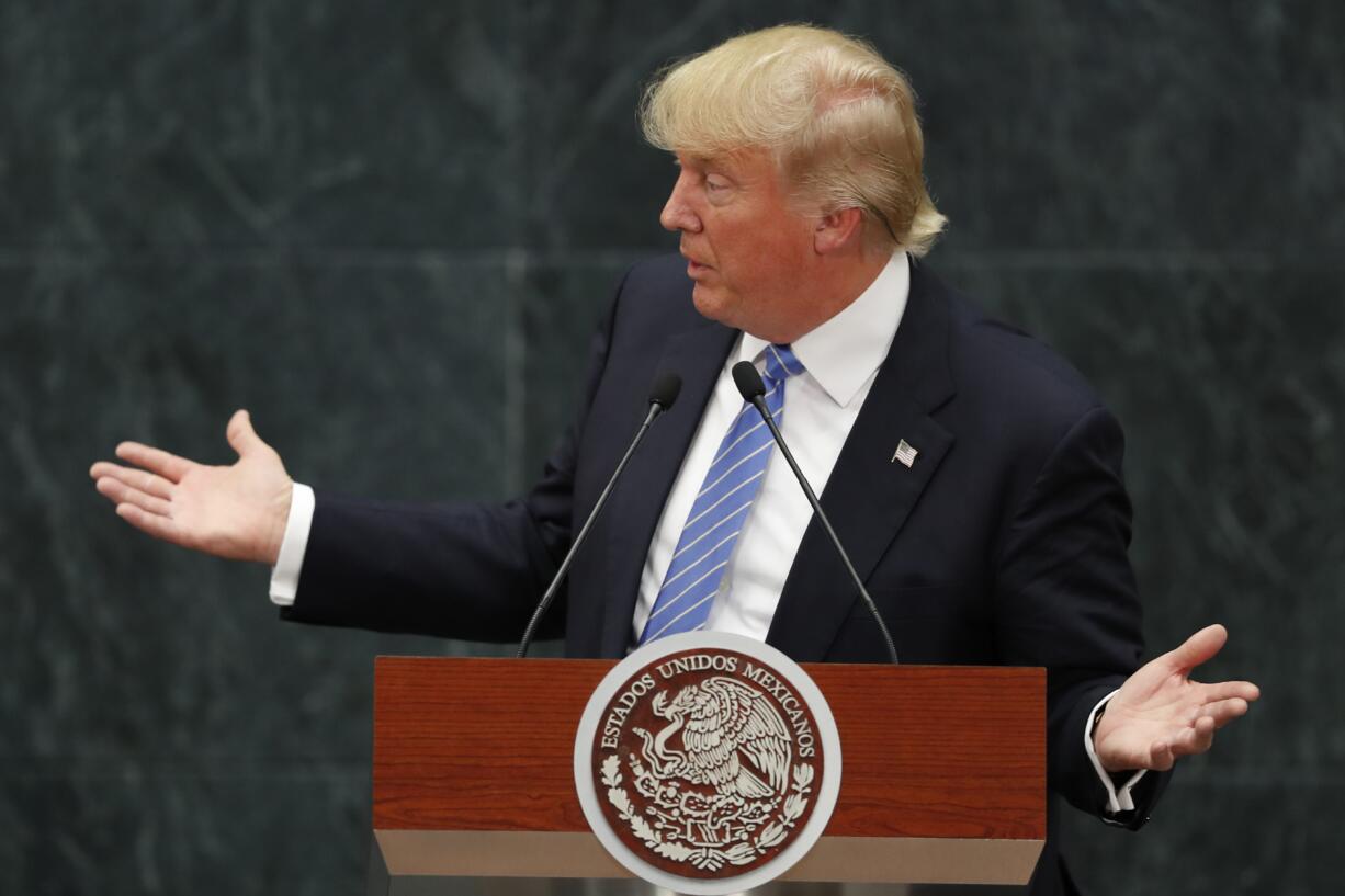 Republican presidential nominee Donald Trump speaks during a joint statement with Mexico's President Enrique Pena Nieto in Mexico City, Wednesday, Aug. 31, 2016. Trump is calling his surprise visit to Mexico City a 'great honor.' The Republican presidential nominee said after meeting with Peña Nieto that the pair had a substantive, direct and constructive exchange of ideas.