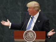 Republican presidential nominee Donald Trump speaks during a joint statement with Mexico's President Enrique Pena Nieto in Mexico City, Wednesday, Aug. 31, 2016. Trump is calling his surprise visit to Mexico City a 'great honor.' The Republican presidential nominee said after meeting with Peña Nieto that the pair had a substantive, direct and constructive exchange of ideas.