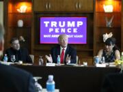 Republican presidential candidate Donald Trump leads a Hispanic leaders and small business owners roundtable in Las Vegas, Friday, Aug. 26, 2016. Left is Pastor Pasqual Urrabazo, of the International Church of Las Vegas, and right is Irma Aguirre, a local business owner.