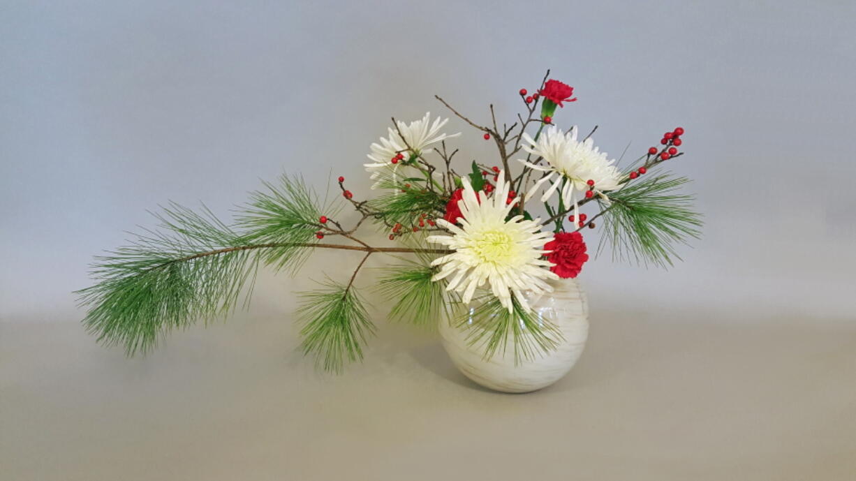 This ikebana might be appropriate for Christmas.