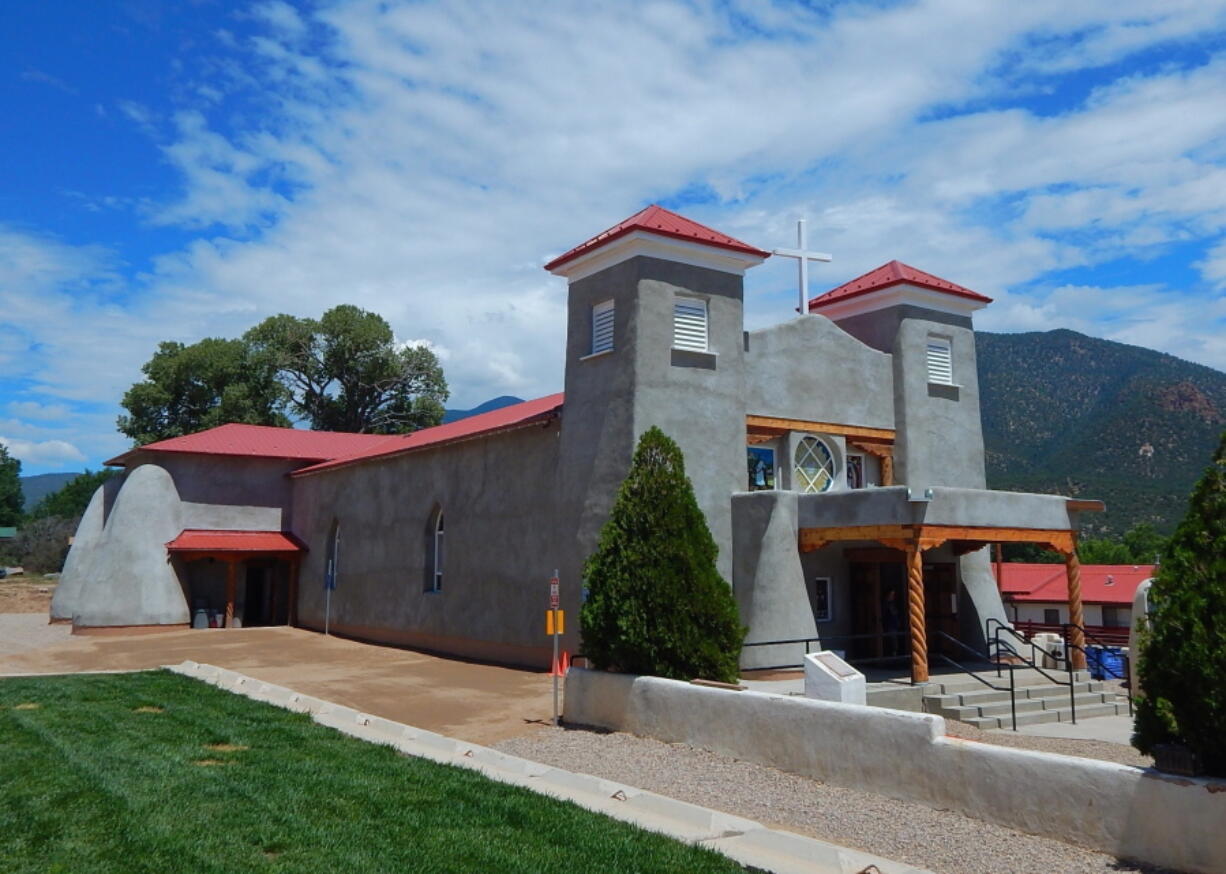 The exterior of the reconstructed San Antonio Catholic Church in Questa, N.M.