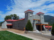 The exterior of the reconstructed San Antonio Catholic Church in Questa, N.M.