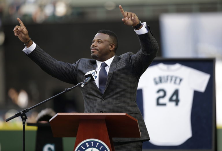 Seattle Mariners Hall-of-Famer Ken Griffey Jr. reacts to the crowd during a ceremony to retire his number 24, Saturday, Aug. 6, 2016, at Safeco Field in Seattle.