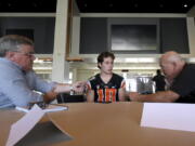 Reporters talk to Oregon State quarterback Darell Garretson during the NCAA college football team&#039;s media day at Reeser Stadium in Corvallis, Ore., on Tuesday, Aug. 2, 2016.