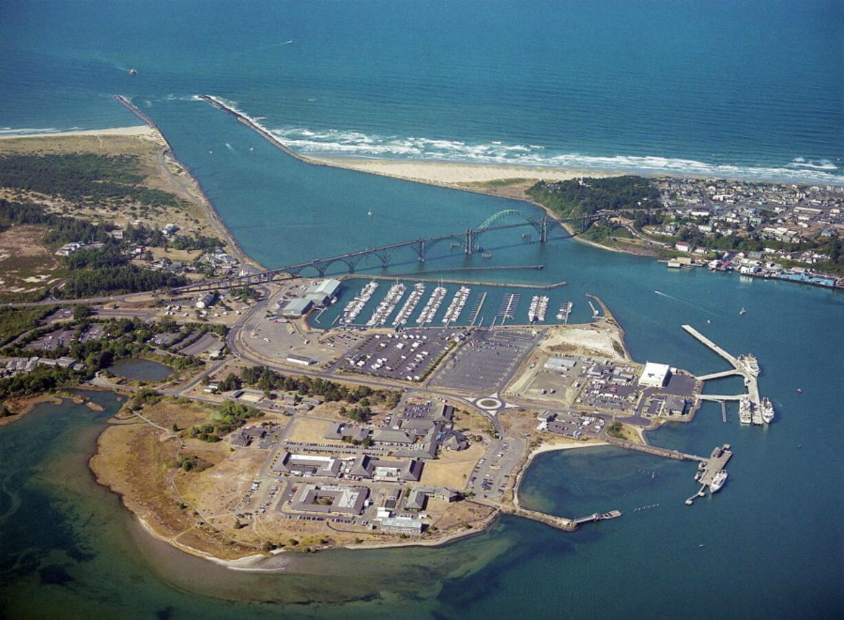 This undated aerial photo supplied by Oregon State University shows the OSU Hatfield Marine Science Center at the mouth of the Yaquina River in Newport, Ore. Oregon State University is moving ahead with plans to build a $50 million expansion to house its marine science initiative in a tsunami inundation zone in Newport despite warnings from a state geologist that the site could make it vulnerable to a major earthquake and put it in the path of a subsequent tsunami.