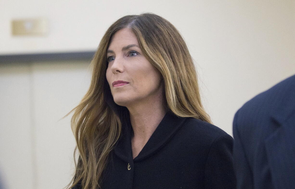 Pennsylvania Attorney General Kathleen Kane enters a courtroom Monday at the Montgomery County Courthouse in Norristown, Pa. She was convicted of nine charges in a perjury and obstruction case. Kane said she&#039;ll appeal.