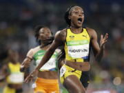 Jamaica&#039;s Elaine Thompson wins the gold in the women&#039;s 100-meter final during the athletics competitions in the Olympic stadium of the 2016 Summer Olympics in Rio de Janeiro, Brazil, Saturday, Aug. 13, 2016. (AP Photo/David J.