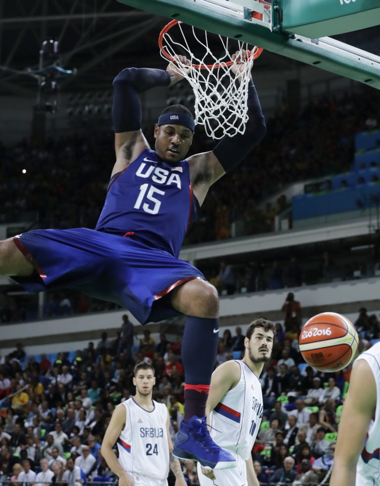 United States' Carmelo Anthony (15) dunks against Serbia during the men's gold medal basketball game at the 2016 Summer Olympics in Rio de Janeiro, Brazil, Sunday, Aug. 21, 2016.