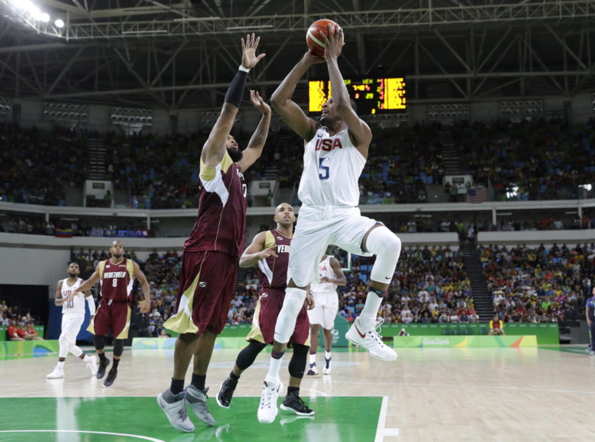 United States&#039; Kevin Durant (5) shoots over Venezuela&#039;s Gregory Echenique (0) during a men&#039;s basketball game at the 2016 Summer Olympics in Rio de Janeiro, Brazil, Monday, Aug. 8, 2016.