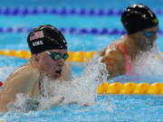 United States&#039; Lilly King, left, and Russia&#039;s Yulia Efimova head for home in the final of the women&#039;s 100-meter breaststroke on Monday.