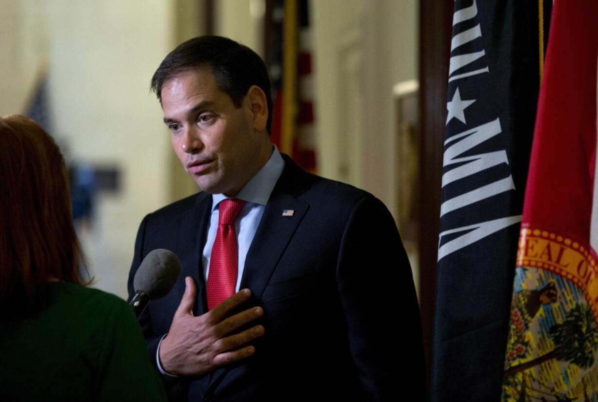 Sen. Marco Rubio, R-Fla., speaks to media outside his office on Capitol Hill in Washington. A key question looms for vulnerable Republican senators this election season: If Donald Trump loses and loses big, can they still survive? Trump???s declining standing in the polls has GOP Senate candidates preparing for the worst 11 weeks before Election Day, and they???re maneuvering now to put as big a margin as they can between themselves and the top of the ticket.