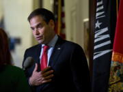 Sen. Marco Rubio, R-Fla., speaks to media outside his office on Capitol Hill in Washington. A key question looms for vulnerable Republican senators this election season: If Donald Trump loses and loses big, can they still survive? Trump???s declining standing in the polls has GOP Senate candidates preparing for the worst 11 weeks before Election Day, and they???re maneuvering now to put as big a margin as they can between themselves and the top of the ticket.