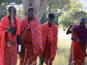 Members of Kenya&#039;s Maasai tribe on a training mission March 5 in Kenya&#039;s Maasai Mara region. They were participating in a program to brush up on their skills as safari guides. The program also allows tourists to learn alongside them so that they&#039;re not just riding along for photo opportunities, but are instead actively learning to tune into the sights and sounds of the natural world.