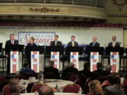 Eight of the 11 candidates for Washington lieutenant governor take part in a debate in Spokane on June 14. From left, Marty McClendon, Paul Addis, Sen. Karen Fraser, D-Olympia, Sen. Steve Hobbs, D-Lake Stevens, Bill Penor, Javier Figueroa, Sen. Cyrus Habib, D-Bellevue, and Phillip Yin, all stand at their podiums. The top two vote-getters in the Aug. 2, 2016 primary will advance to the Nov. 8, 2016, general election. (AP Photo/Nicholas K.