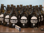 Brand new growlers are seen at Victor-23 Craft Brewery on Thursday morning.