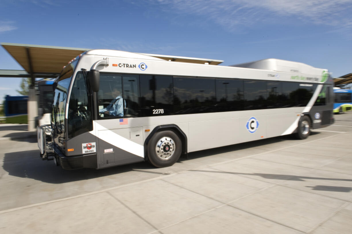 C-Tran was awarded a federal grant to purchase 10 new diesel-electric hybrid buses like this one dropping and picking up passengers in Hazel Dell.