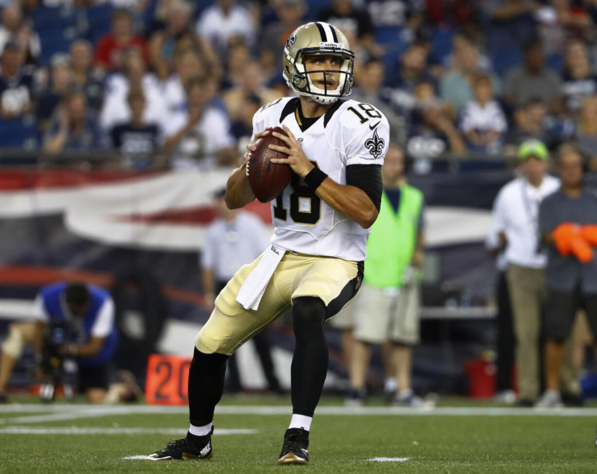 New Orleans Saints quarterback Garrett Grayson looks to pass against the New England Patriots during the first half of a preseason NFL football game Thursday, Aug. 11, 2016, in Foxborough, Mass.