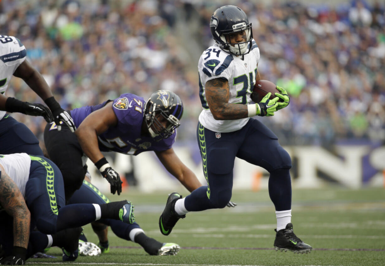 Seattle Seahawks running back Thomas Rawls (34) returns from a broken ankle he suffered late last season.