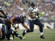 Seattle Seahawks running back Thomas Rawls (34) returns from a broken ankle he suffered late last season.